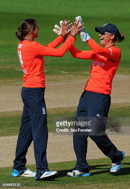 Sarah Taylor and bowler Jenny Gunn of England celebrate a wicket during the Third NatWest Womens T20 International between England and South Africa...