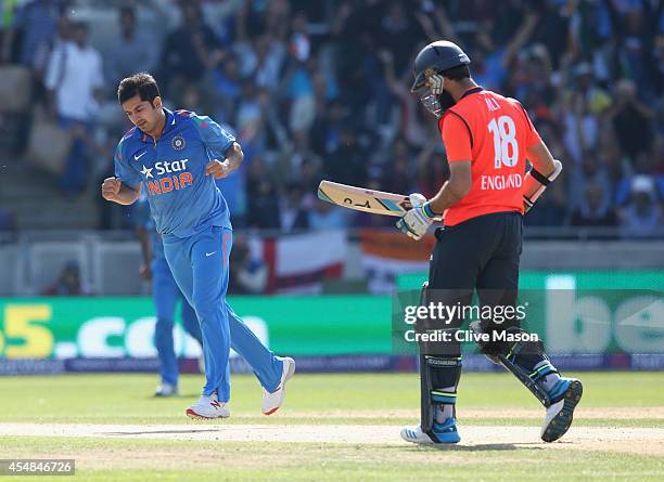 Mohit Sharma of India celebrates dismissing Moeen Ali of England during the NatWest International T20 2014 match between England and India at...