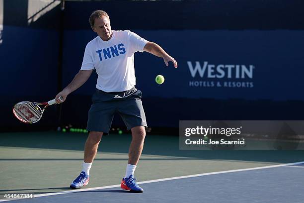 Starwood Preferred Guest hosts a private tennis clinic with Patrick McEnroe for SPG members at the US Open at the USTA Billie Jean King National...
