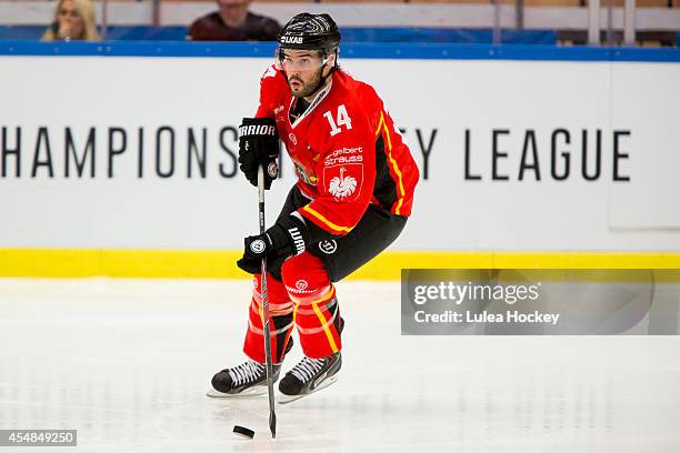 Stephen Dixon of Lulea Hockey handles the puck during the Champions Hockey League group stage game between Lulea Hockey and Nottingham Panthers on...