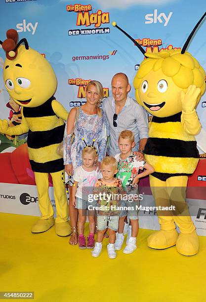 Arjen Robben and his wife Bernadien with their kids Lynn, Luka and Kai attend the German premiere of the film 'Die Biene Maja - Der Kinofilm' at...