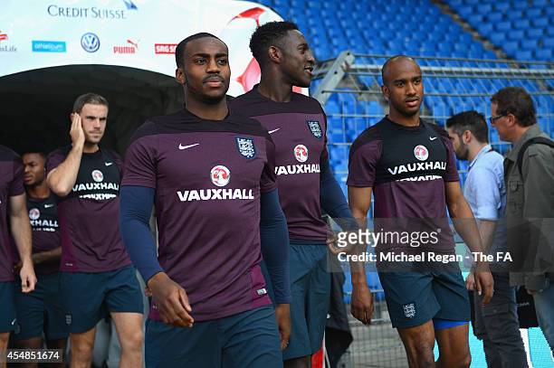 Danny Rose, Danny Welbeck and Fabian Delph look on during the England training session at St. Jakob-Park on September 7, 2014 in Basel, Basel-Stadt.