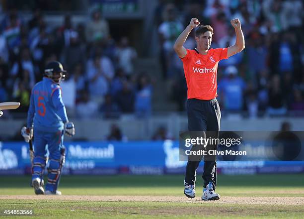 Chris Woakes of England celebrates victory afer he bowled the last ball of the match to MS Dohni of India during the NatWest International T20 2014...