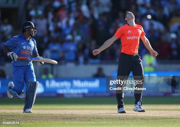 Chris Woakes of England celebrates victory afer he bowled the last ball of the match to MS Dohni of India during the NatWest International T20 2014...