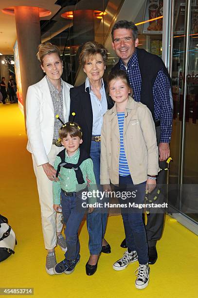 Caroline Reiber and her son Marcus Maier with wife Cathrin and children Laurentius and Magdalena attend the German premiere of the film 'Die Biene...