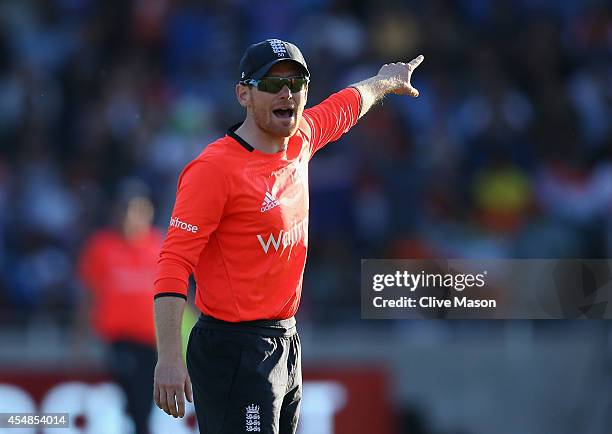 Eoin Morgan of England sets the field during the last over during the NatWest International T20 2014 match between England and India at Edgbaston on...