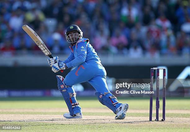 Suresh Raina of India in action during the NatWest International T20 2014 match between England and India at Edgbaston on September 7, 2014 in...