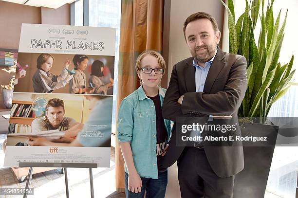 Actor Ed Oxenbould and Writer/Director/Producer Robert Connolly attend the "Paper Planes" photo call during the 2014 Toronto International Film...