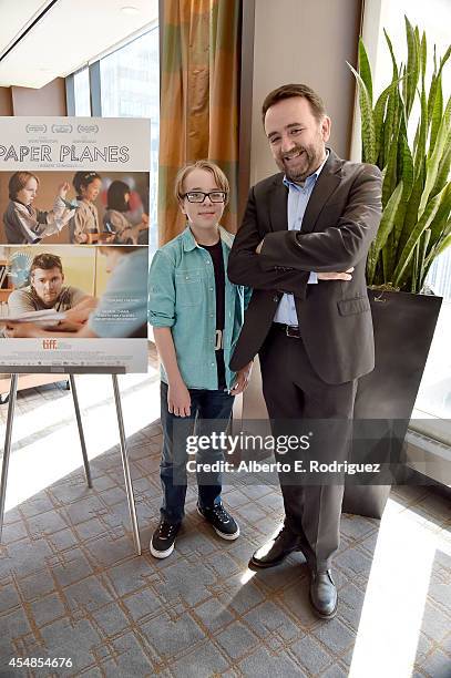 Actor Ed Oxenbould and Writer/Director/Producer Robert Connolly attend the "Paper Planes" photo call during the 2014 Toronto International Film...