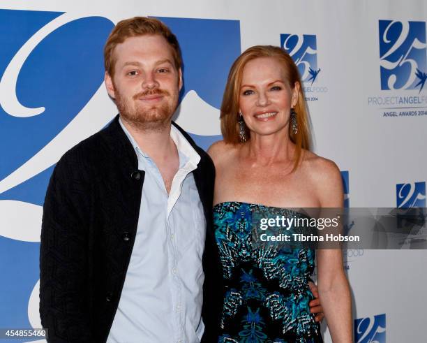 Marg Helgenberger and her son, Hugh Howard Rosenberg, attend Project Angel Food's 25th year celebration at Project Angel Food on September 6, 2014 in...