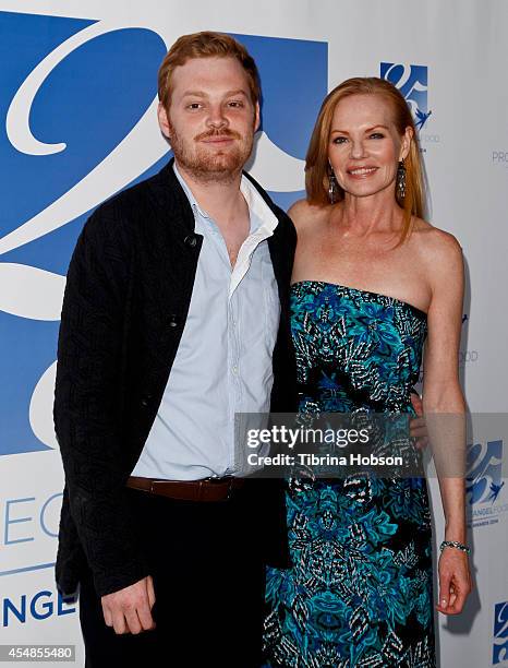 Marg Helgenberger and her son, Hugh Howard Rosenberg, attend Project Angel Food's 25th year celebration at Project Angel Food on September 6, 2014 in...