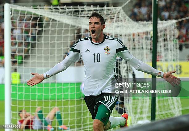 Northern Ireland's striker Kyle Lafferty celebrates after scoring during the UEFA Euro 2016 Group F qualifying match of Hungary vs Northern Ireland...