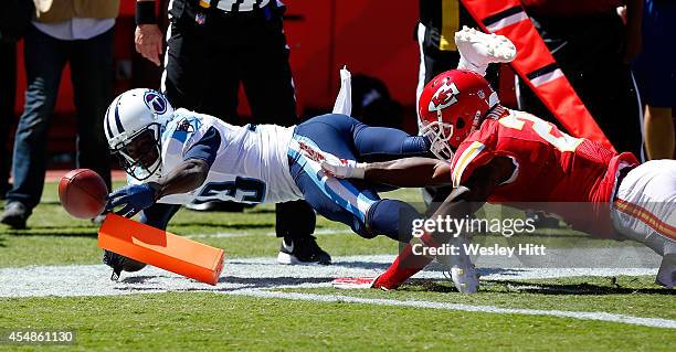 Kendall Wright of the Tennessee Titans dives in for a touchdown against Sean Smith of the Kansas City Chiefs during the third quarter at Arrowhead...
