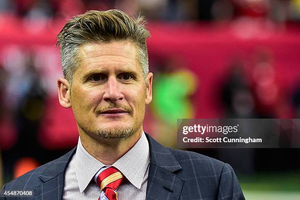 Thomas Dimitroff, general manager of the Atlanta Falcons, stands on the field in the second half against the New Orleans Saints at the Georgia Dome...