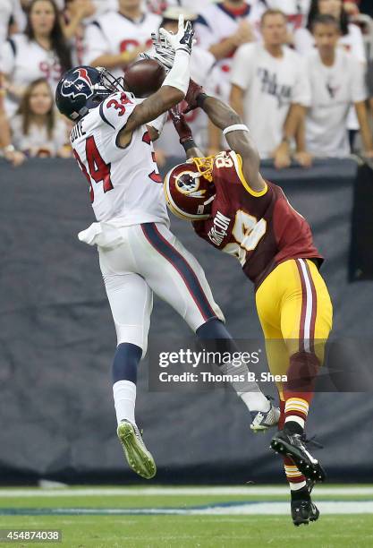 Cornerback A.J. Bouye of theHouston Texans breaks up the pass intended for wide receiver Pierre Garcon of the Washington Redskins in the third...
