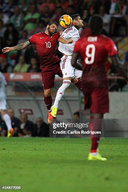 Portugal forward Vieirinha battles Albania midfielder Taulant Xhaka during the EURO 2016 qualification match between Portugal and Albania at Estadio...