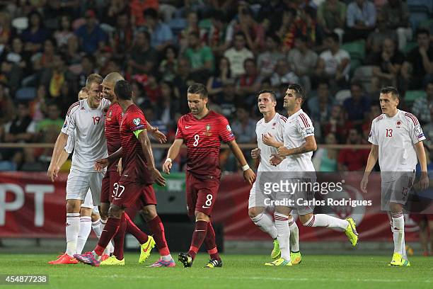 Albania players celebrate a goal by forward Bekim Balaj during the EURO 2016 qualification match between Portugal and Albania at Estadio de Aveiro on...