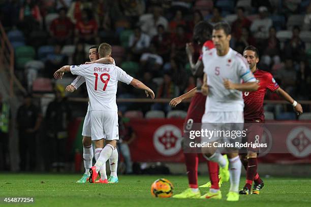 Albania players celebrates a goal by forward Bekim Balaj during the EURO 2016 qualification match between Portugal and Albania at Estadio de Aveiro...