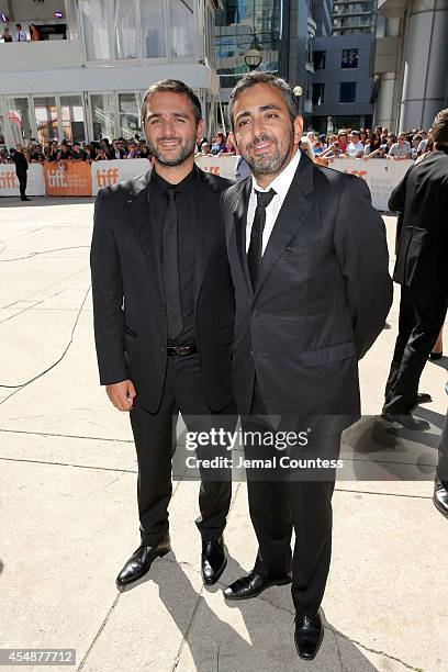 Writer/directors Olivier Nakache and Eric Toledano attend the "Samba" premiere during the 2014 Toronto International Film Festival at Roy Thomson...