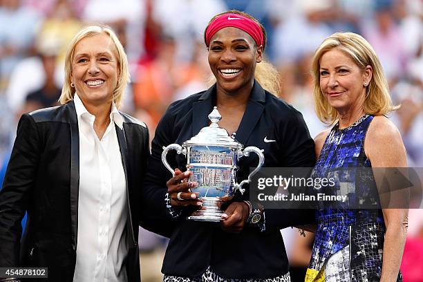 Martina Navratilova, Serena Williams of the United States and Chris Evert pose after the women's singles final match on Day fourteen of the 2014 US...