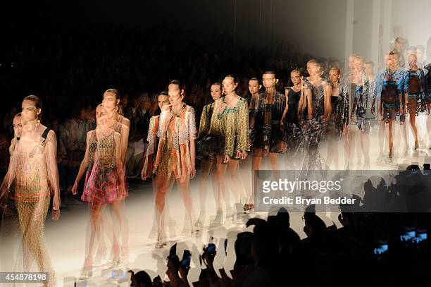Models walk the runway at Custo Barcelona show during Mercedes-Benz Fashion Week Spring 2015 on September 7, 2014 in New York City.