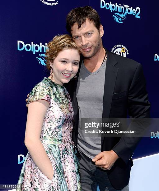 Cast member Cozi Zuehlsdorff and Harry Connick Jr., pose during the film premiere of Warner Bros. Pictures' and Alcon Entertainment's '"Dolphin Tale...
