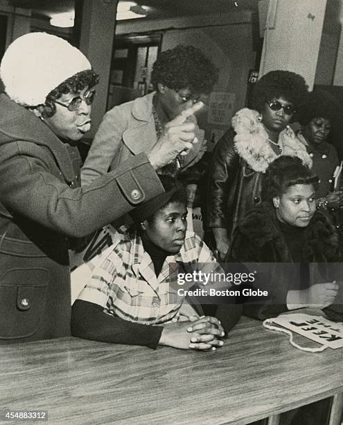 Catherine Tab protests the closing of her children's school, Ira Allen School, in Boston on March 29, 1974. The Racial Imbalance Act was passed in...
