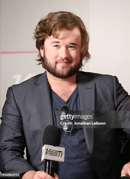 Actress Haley Joel Osment attends the Variety Studio presented by Moroccanoil at Holt Renfrew during the 2014 Toronto International Film Festival on...