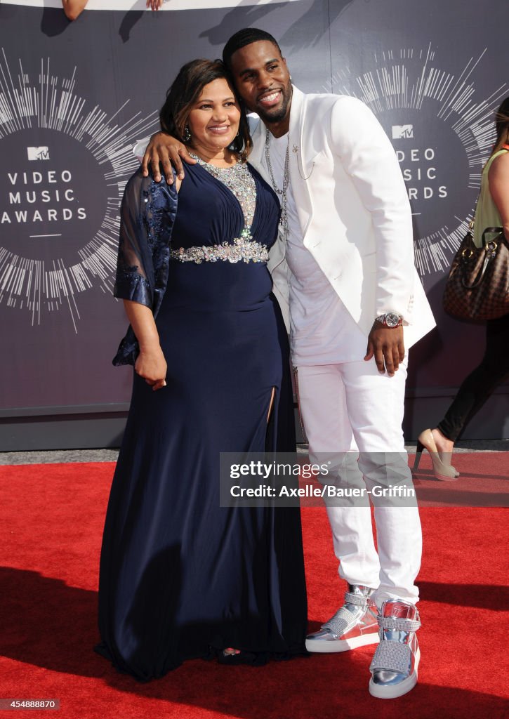 Singer Jason Derulo and his mother Jochlin Desrouleaux arrive at the