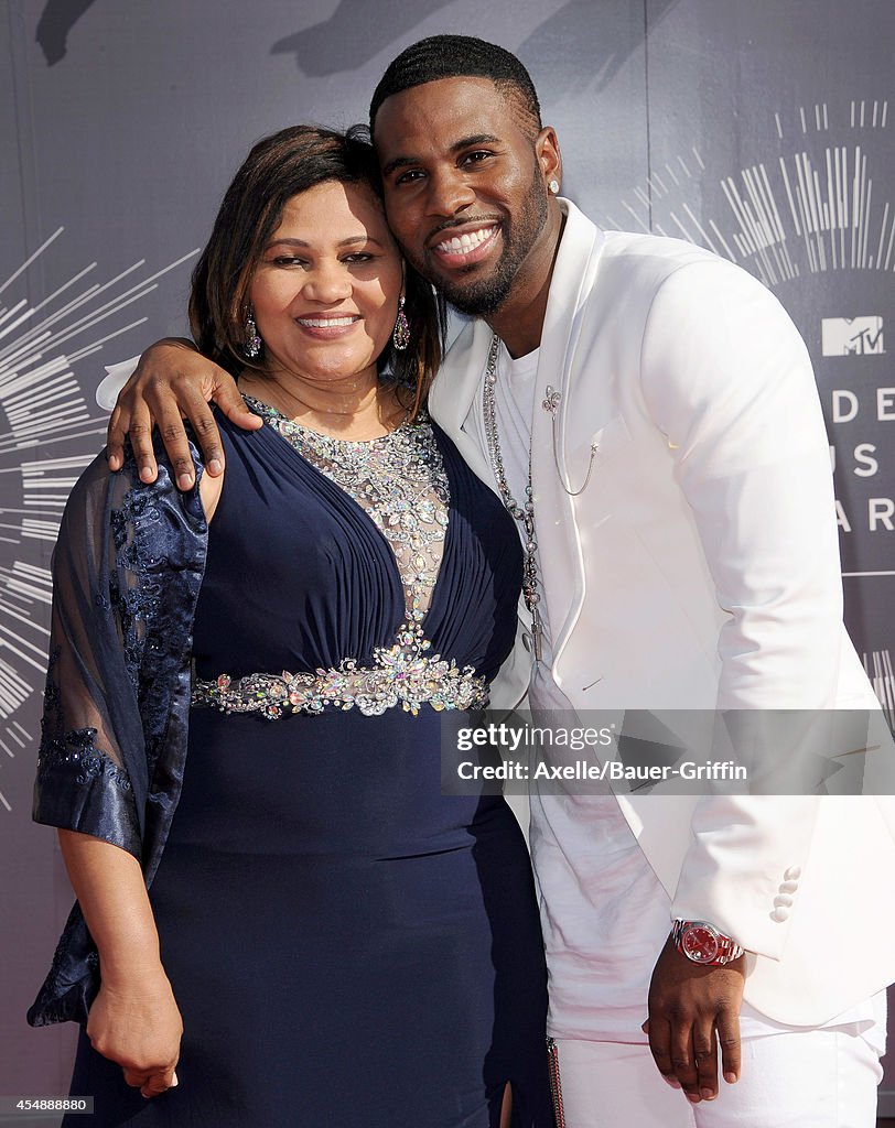 Singer Jason Derulo and his mother Jochlin Desrouleaux arrive at the