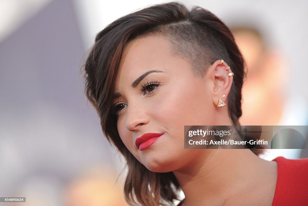 2014 Style Musically Actress/singer Demi Lovato arrives at the 2014 MTV Video Music Awards ...