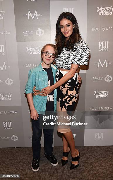 Actors Ed Oxenbould and Nicole Trunfio attend the Variety Studio presented by Moroccanoil at Holt Renfrew during the 2014 Toronto International Film...