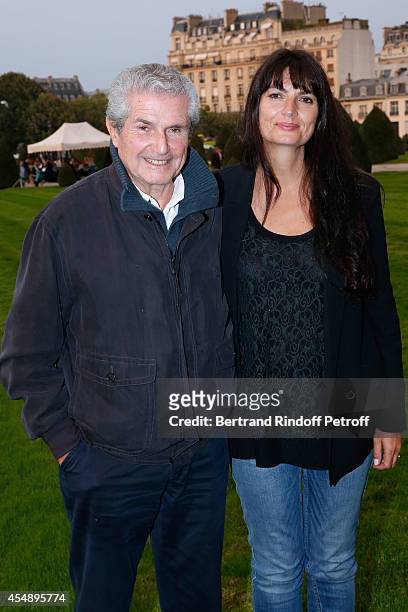 Director Claude Lelouch and his companion Photographer Valerie Perrin attend the 'Claude Lelouch en Musique ! Held at the Invalides in Paris on...