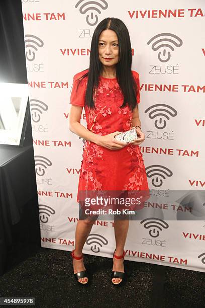 Designer Vivienne Tam backstage at Vivienne Tam during Mercedes-Benz Fashion Week Spring 2015 at The Theatre at Lincoln Center on September 7, 2014...