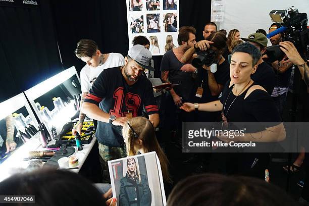 Models prepare backstage during the Mercedes-Benz Lounge during Mercedes-Benz Fashion Week Spring 2015 at Lincoln Center on September 7, 2014 in New...