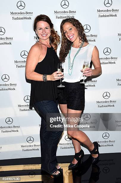 Janet May and Gina DeBonis attend the Mercedes-Benz Lounge during Mercedes-Benz Fashion Week Spring 2015 at Lincoln Center on September 7, 2014 in...