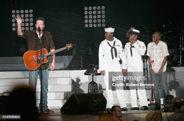 Blake Shelton and JCPenney honor a military USO family, Roland Kiendrebeogo, his wife Marie Esther Kiendrebeogo and their son Oswald Kiendrebeogo ,...