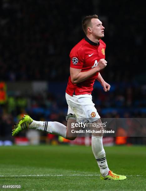Phil Jones of Manchester United celebrates scoring the opening goal during the UEFA Champions League Group A match between Manchester United and...