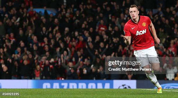 Phil Jones of Manchester United celebrates scoring their first goal during the UEFA Champions League Group A match between Manchester United and...