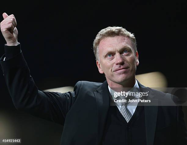 Manager David Moyes of Manchester United walks off after the UEFA Champions League Group A match between Manchester United and Shakhtar Donetsk at...