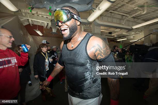 The Boston Red Sox celebrate after defeating the Detroit Tigers in Game Six of the American League Championship Series to clinch the American League...