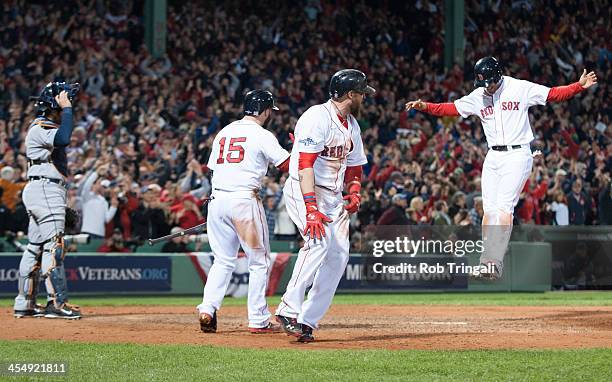 Shane Victorino of the Boston Red Sox celebrates after hitting a grand slam in the bottom of the seventh inning during Game Six of the American...