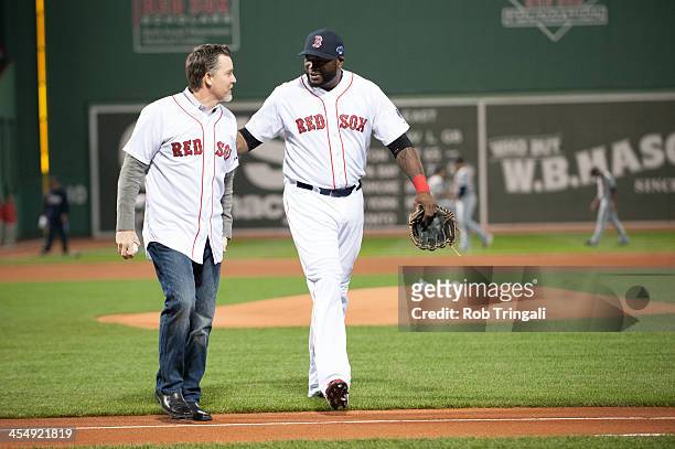 Former Red Sox third baseman Bill Mueller and David Ortiz talk before Game Six of the American League Championship Series on October 19, 2013 at...