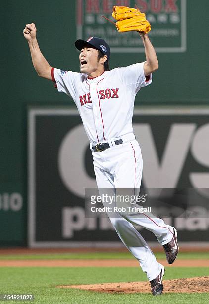 Koji Uehara of the Boston Red Sox celebrates after defeating the Detroit Tigers during Game Six of the American League Championship Series on October...