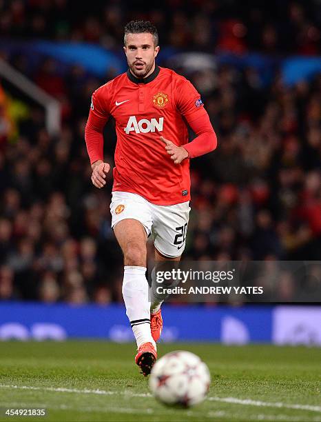 Manchester United's Dutch striker Robin van Persie chases the ball during the UEFA Champions League football match between Manchester United and...