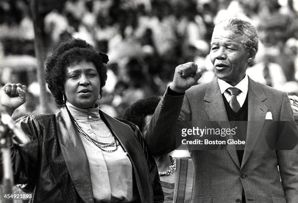 Nelson Mandela and Winnie Mandela gesture to supporters in Soweto, South Africa, on Feb. 13 two days after his release from prison in Cape Town. He...