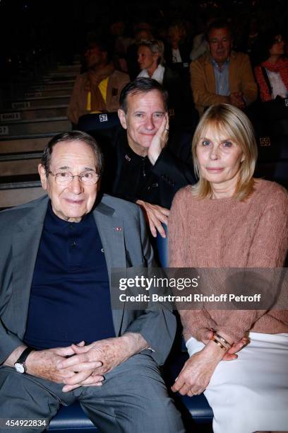 Actor Francis Huster standing between Director Robert Hossein and his wife Candice Patou attend the 'Claude Lelouch en Musique ! Held at the...