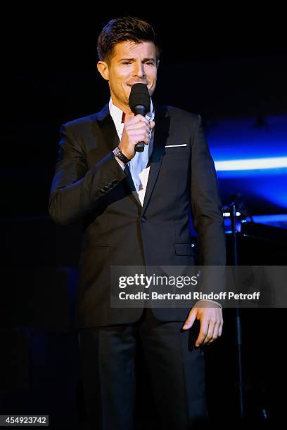 Singer Vincent Niclo performs during the 'Claude Lelouch en Musique ! Held at the Invalides in Paris on September 6, 2014 in Paris, France.