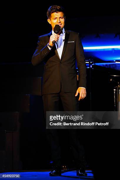 Singer Vincent Niclo performs during the 'Claude Lelouch en Musique ! Held at the Invalides in Paris on September 6, 2014 in Paris, France.