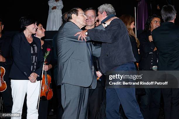 Singer Liane Foly, director Robert Hossein, Actor Francis Huster and director Claude Lelouch on stage at the end of the 'Claude Lelouch en Musique !...